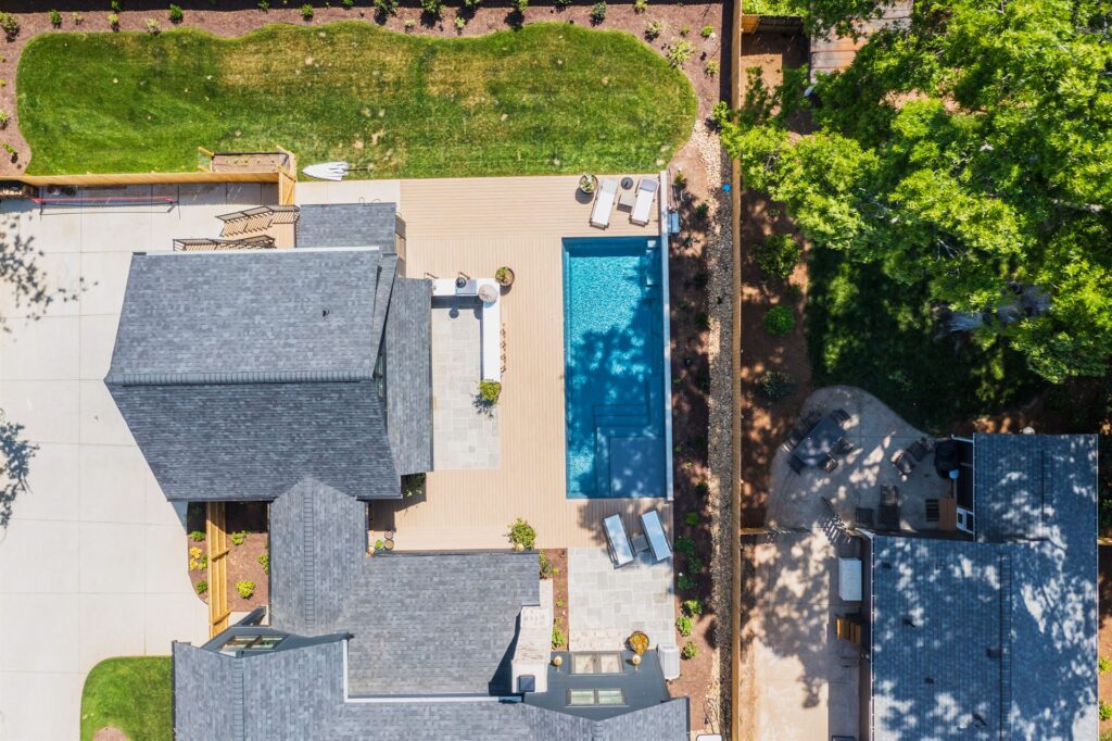 018. River Pools M35 in Granite Gray with composite wood patio and coping